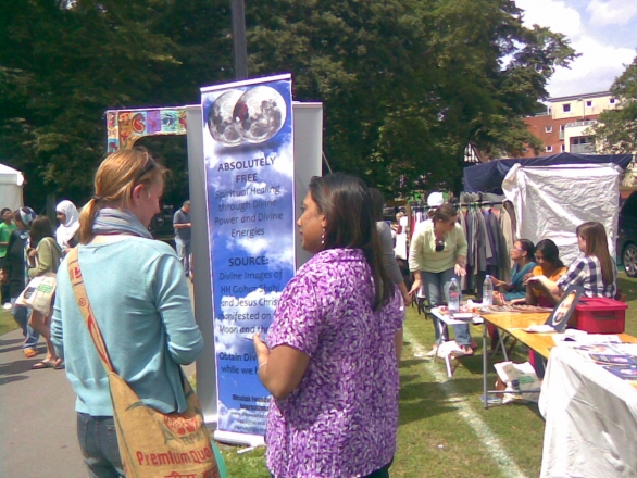 Ms. Nilma Prabhu explains our message to an eager young lady.
