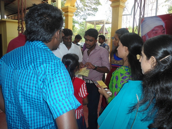 Presenter from KAF Bangladesh presents the message of Kalki Avatar Ra Gohar Shahi to aspirants at the temple (Shivan Temple, Chi