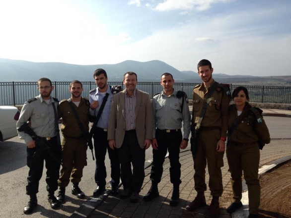 Mr Steve Bell with a group of Israeli soldiers, having given them the message of the Awaited Messiah Lord Ra Riaz Gohar Shahi.