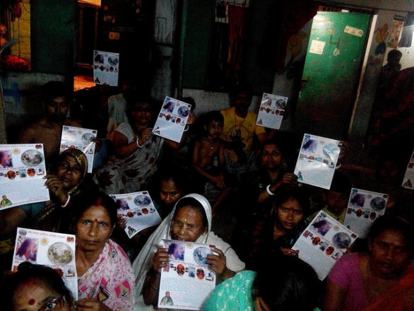 People holding leaflets pose for the camera after receiving the message of Kalki Avatar Ra Gohar Shahi (Bishnu Bazar, Dhaka, Ban