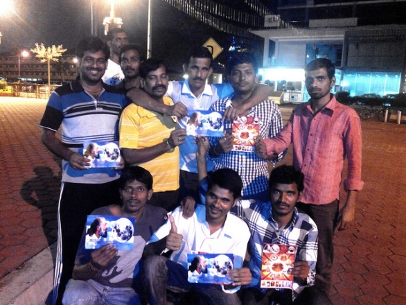 Temple-goers pose for the camera after receiving the message of Kalki Avatar Ra Gohar Shahi.
